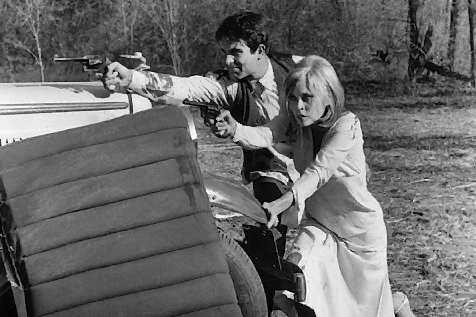 Stripped of moral scruples, Clyde (Warren Beatty) and Bonnie (Faye Dunaway) defend against the law in Arthur Penn's Bonnie and Clyde.